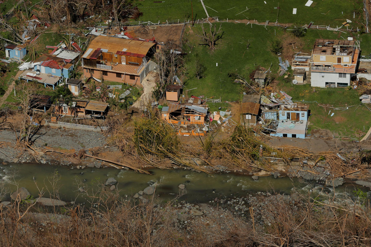 Damaged homes are seen as recovery efforts continue following Hurricane Maria near Ciales, P.R., on Oct. 7. (Photo: Lucas Jackson/Reuters)