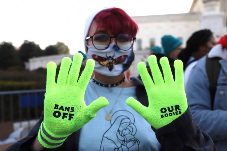 Jo Luttazi, 22, rallies outside the Supreme Court on Dec. 1 as justice heard arguments in a landmark Mississippi case on access to abortion.