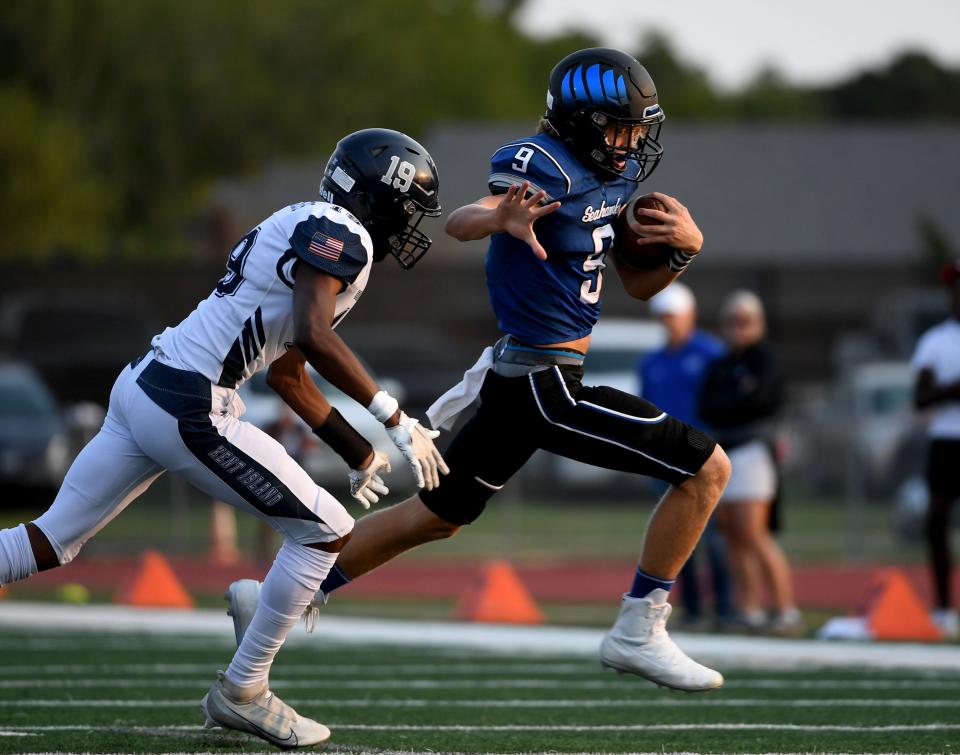 Decatur's Brycen Coleman (9) rushes against Kent Island Friday, Sept. 17, 2022, in Berlin, Maryland. The Buccaneers defeated the Seahawks 31-14.