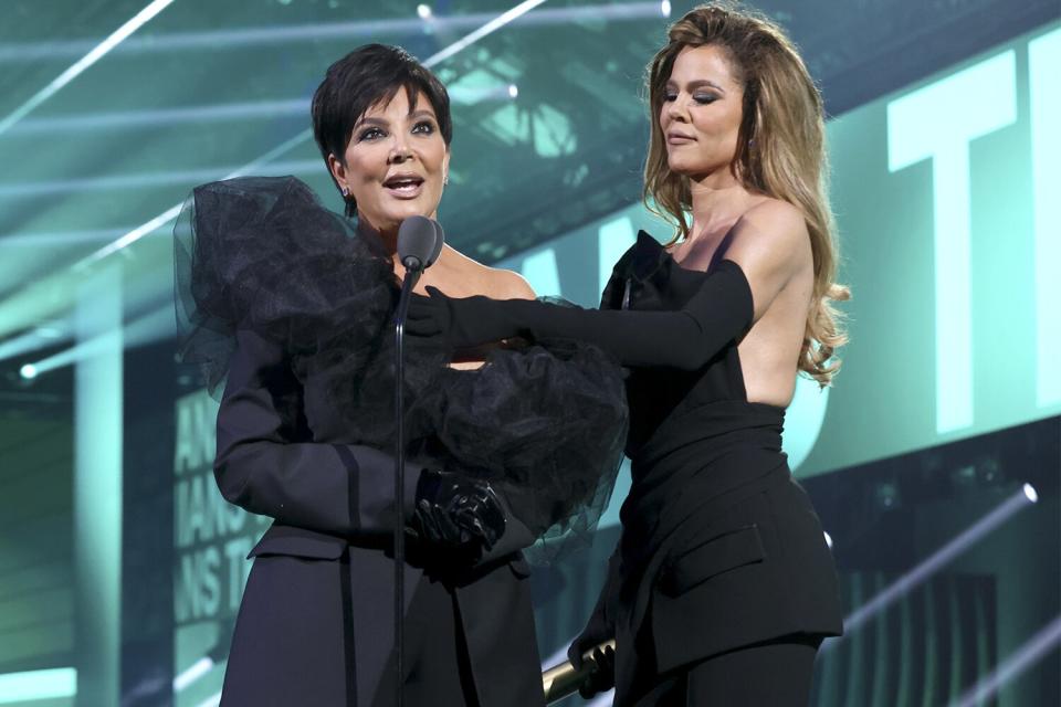 SANTA MONICA, CALIFORNIA - DECEMBER 06: 2022 PEOPLE'S CHOICE AWARDS -- Pictured: (l-r) Kris Jenner and Khloé Kardashian accept the The Reality Show of 2022 award for ‘The Kardashians’ on stage during the 2022 People's Choice Awards held at the Barker Hangar on December 6, 2022 in Santa Monica, California. -- (Photo by Mark Von Holden/E! Entertainment/NBC via Getty Images)