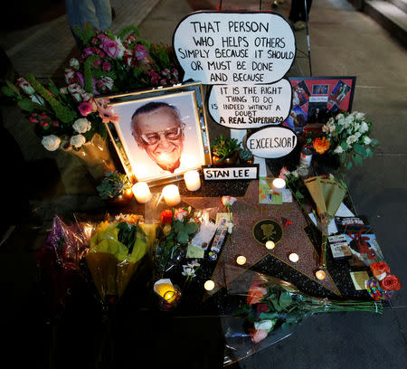 Flowers and mementos are pictured on the star of late Marvel Comics co-creator Stan Lee on the Hollywood Walk of Fame in Los Angeles, California, U.S., November 12, 2018. REUTERS/Mario Anzuoni