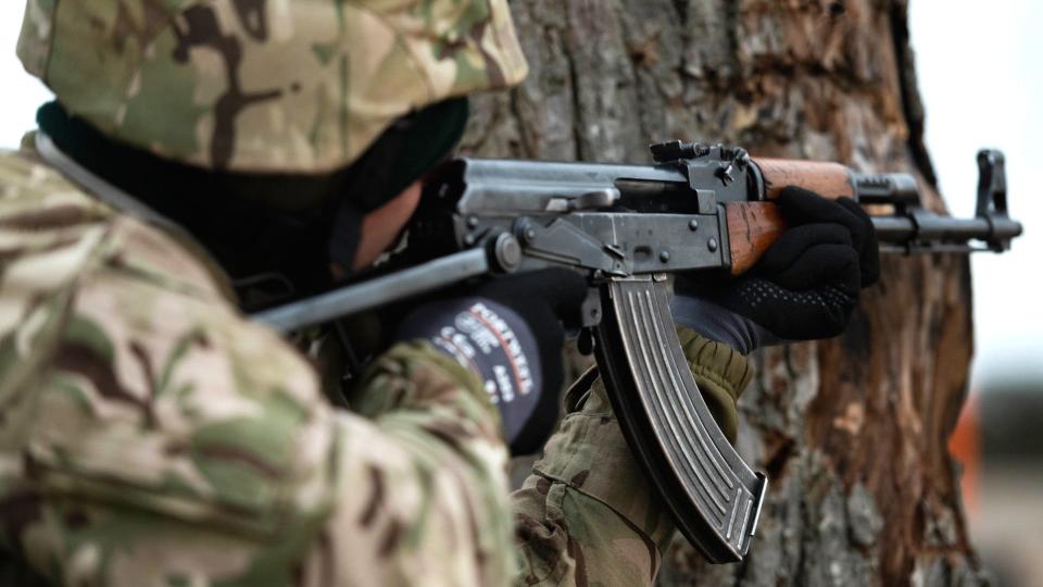 A Ukrainian recruit trains in the United Kingdom with the additional help of the Canadian armed forces in 2022. The individual seen here is carrying a 7.62x39mm AK-47-series rifle, versions of which are in widespread use in Ukraine. <em>Canadian Forces</em>