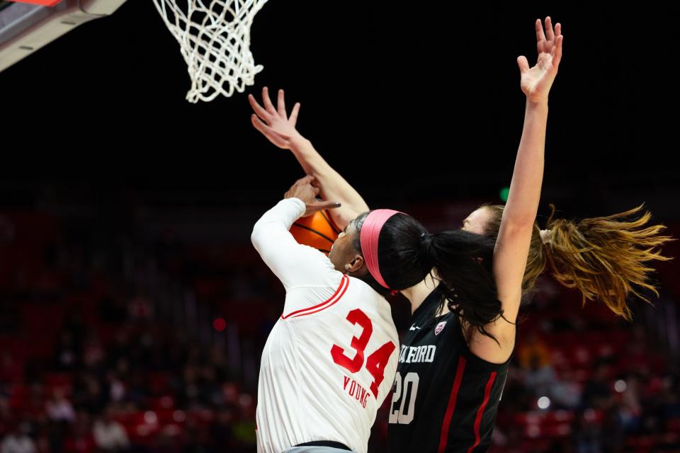 Utah Utes forward Dasia Young (34) shoots the ball with Stanford Cardinal guard Elena Bosgana (20) on defense during a college women’s basketball game between the Utah Utes and the Stanford Cardinal at the Jon M. Huntsman Center in Salt Lake City on Friday, Jan. 12, 2024. | Megan Nielsen, Deseret News