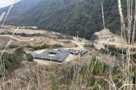 This early 2022 photo provided by Global Witness shows a site near rare earth mines in the Kachin state of Myanmar, where ores are burned down before being transported to China. (Global Witness via AP)