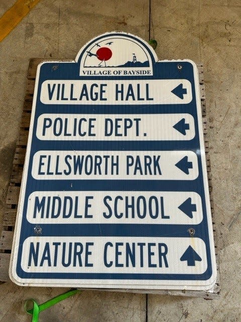 A wayfinding sign sold for $127 during the first round of sign auctioning, the highest amount any sign sold for.