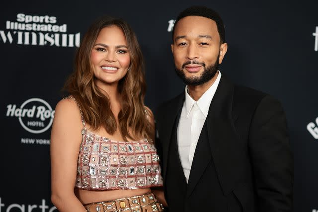 <p>Dimitrios Kambouris/Getty Images</p> Chrissy Teigen and John Legend attend the 'Sports Illustrated Swimsuit' 2024 Issue Release and 60th Anniversary Celebration at Hard Rock Hotel New York on May 16, 2024.