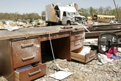 A destroyed desk sits among the rubble at Page Middle School in Gloucester, Virginia. The worst tornadoes to hit parts of the United States in decades have left 44 people dead, stripping roofs off houses and tossing mobile homes into the air like toys, emergency officials said Sunday