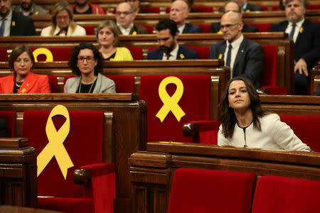 Ines Arrimadas (R), leader of Ciudadanos in Catalonia, sits before the start of the first session of Catalan Parliament after the regional elections in Barcelona, Spain, January 17, 2018. REUTERS/Albert Gea