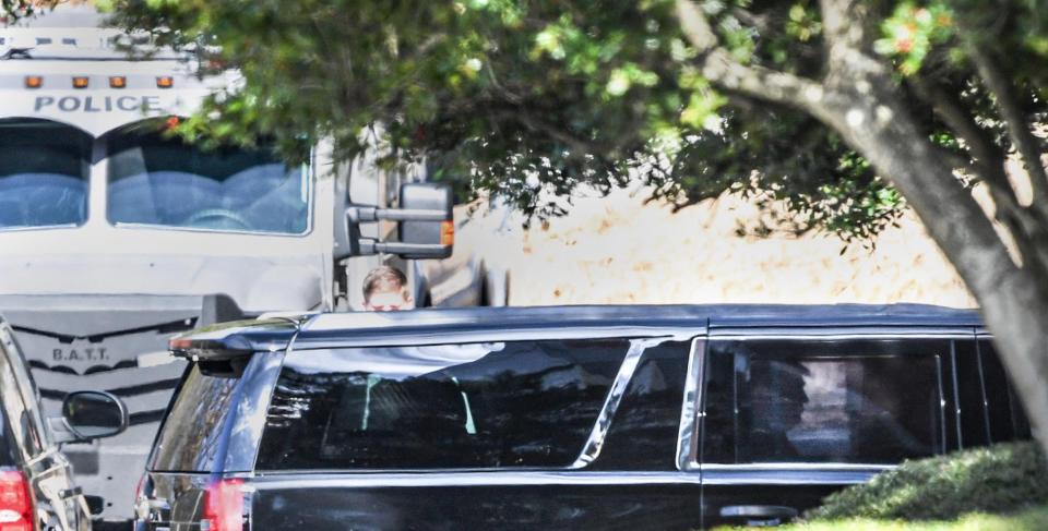 Former U.S. President Donald Trump, inside one of the vehicles, arrives for the videotaping of The Ingraham Angle with host Laura Ingram at the Greenville Convention Center in Greenville, S.C. Tuesday, February 23, 2024.