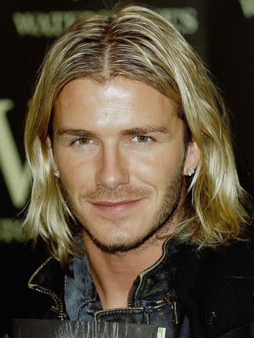 Steve Finn/Getty David Beckham signs copies of his autobiography on November 17, 2003, in London.