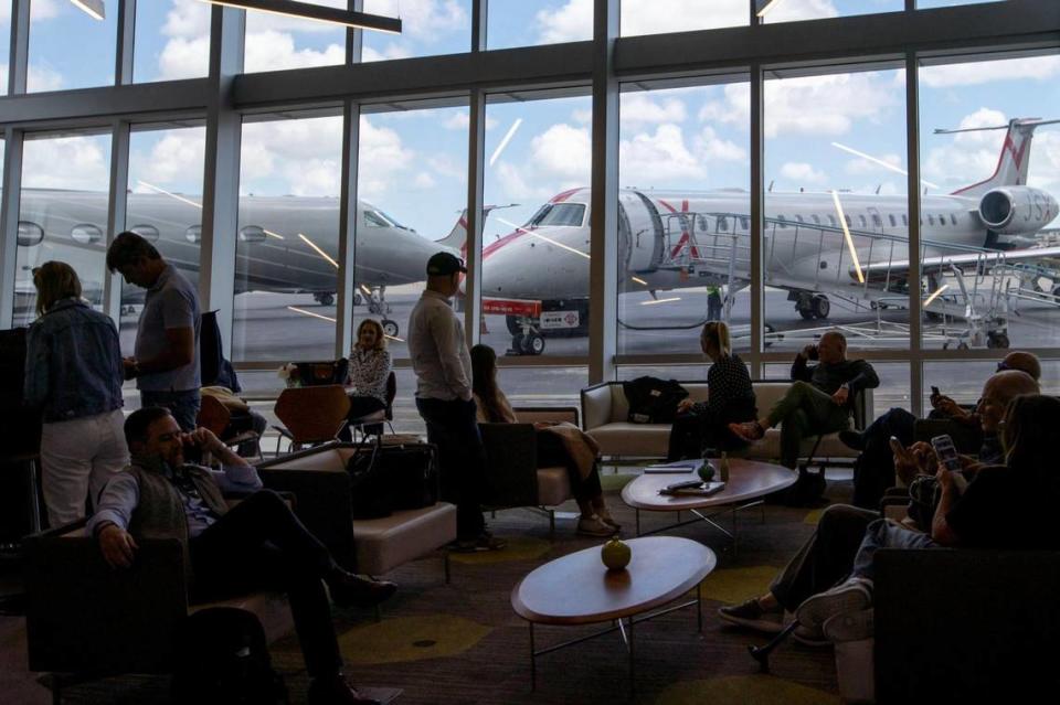 Private flyers await their plane at JSX Terminal in Miami, Florida, on Friday, April 21, 2023.