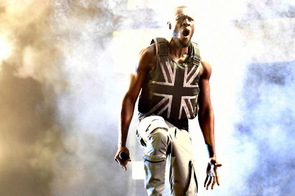 Stormzy performs on the Pyramid Stage at Glastonbury Festival 2019 wearing a vest designed by Banksy (EPA)