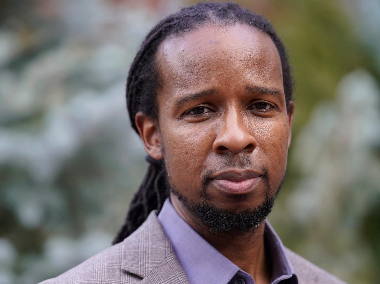 Ibram X. Kendi, director of Boston University's Center for Antiracist Research, stands for a portrait Wednesday, Oct. 21, 2020, in Boston.