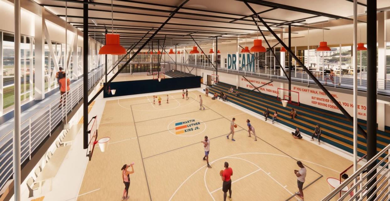 A photo rendering shows the two indoor basketball courts and an indoor walking track to be housed in the Martin Luther King Jr. Dream Center, which is expected to open in February 2025. Construction begins next month.