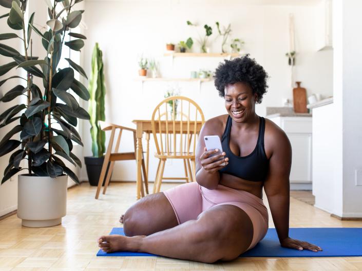 A woman working out at home.