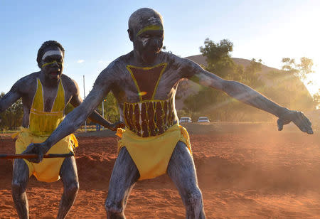 Performers from East Arnhem Land dance during the opening ceremony for the National Indigenous Constitutional Convention, a three day conference designed to come up with a consensus response on how indigenous people should be recognised in Australia's constitution, at Mutitjulu near Uluru in central Australia, May 23, 2017. AAP/Lucy Hughes Jones/via REUTERS