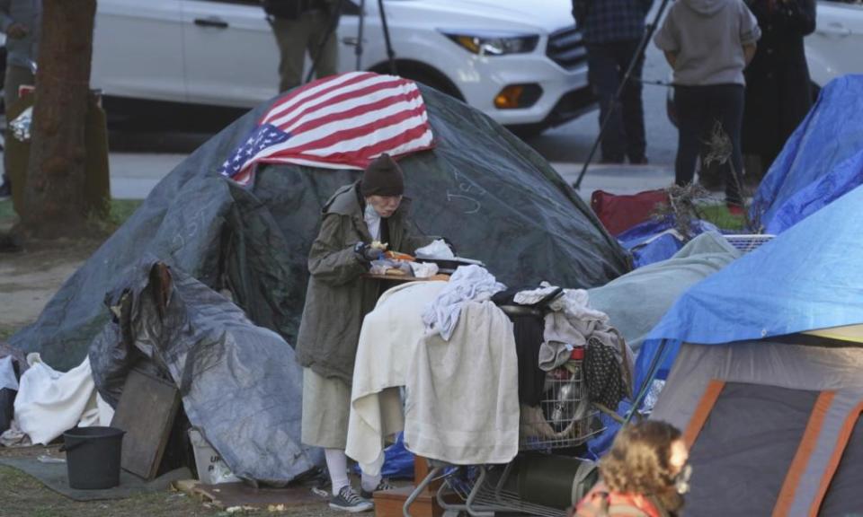 A woman at Echo Park homeless encampment in Los Angeles. California has more people who are homeless than any other state.