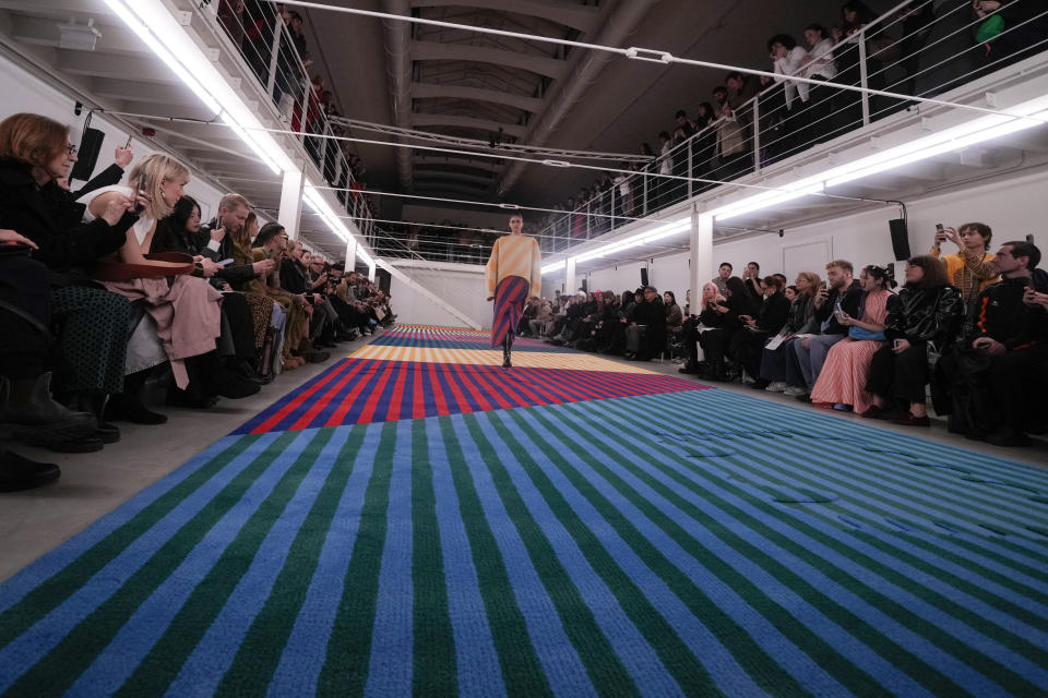 A model wears a creation as part of the Sunnei women's Fall-Winter 2024-25 collection presented in Milan, northern Italy, Friday, Feb. 23, 2024. (AP Photo/Luca Bruno)