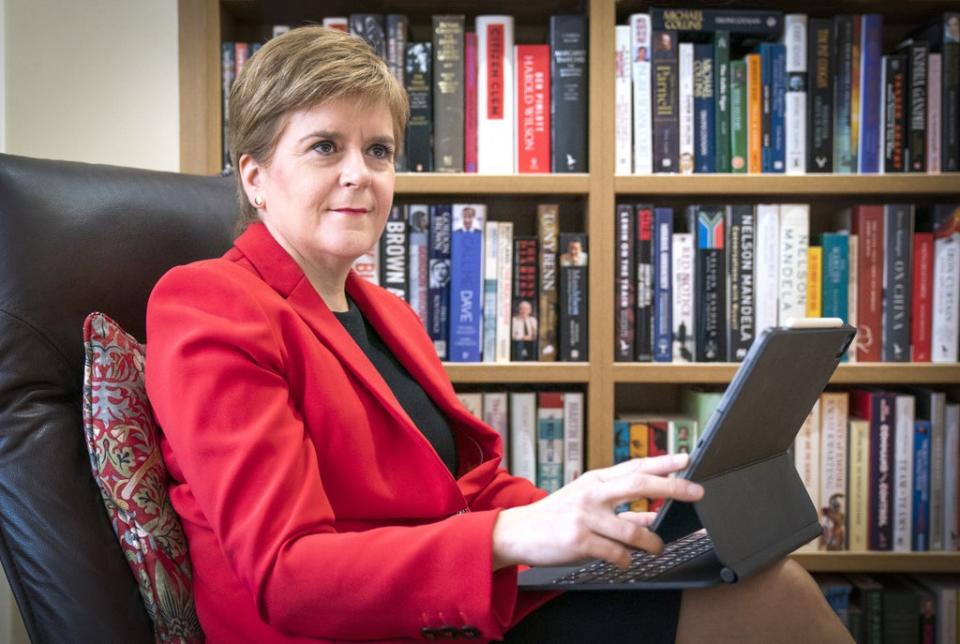 First Minister Nicola Sturgeon at her home in Glasgow preparing her speech she will give to the SNP National Conference virtually on Monday (Jane Barlow/PA) (PA Wire)