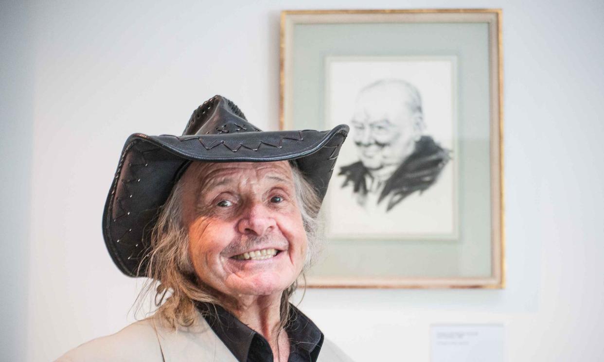 <span>Paul Trevillion pictured in 2016 with his portrait of Churchill in the background. </span><span>Photograph: VanessaChampion.co.uk</span>