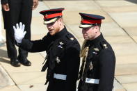 <p>A nervous-looking Harry waved to crowds with his brother William by his side before entering the chapel. Photo: Getty </p>