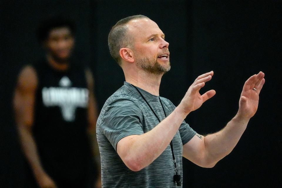 Louisville coach Pat Kelsey instructs his team during practice before the Cards head to the Bahamas. July 26, 2024