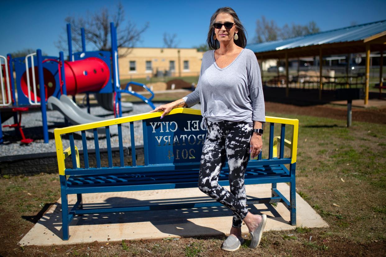 Michelle Caruso is pictured at a park across the street from her Del City home. Caruso is against the proposed new county jail location being close to her home.
