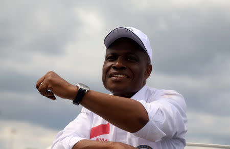 Congolese opposition presidential candidate Martin Fayulu waves to supporters as he arrives at N'djili International Airport in Kinshasa, Democratic Republic of Congo November 21, 2018. REUTERS/Kenny Katombe/File Photo