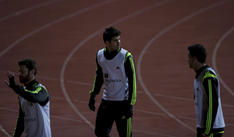 Spain's Diego Costa, centre leaves his first training session with Spain in Madrid, Monday March 3, 2014. Spain will play Italy Wednesday in a friendly soccer match. (AP Photo/Paul White)