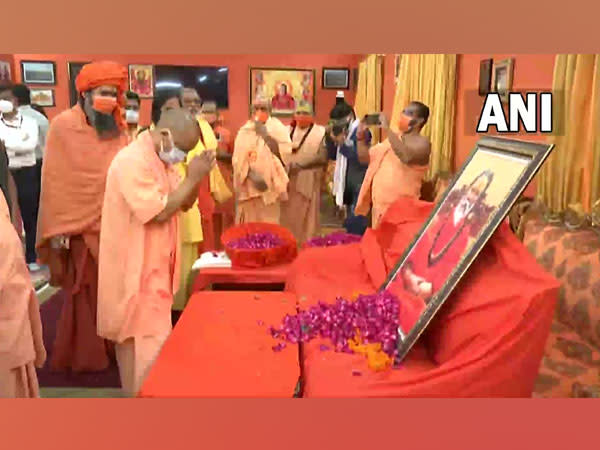 UP Chief Minister Yogi Adityanath pays his last respects to ABAP President Mahant Narendra Giri at the Baghambhari Math in Prayagraj