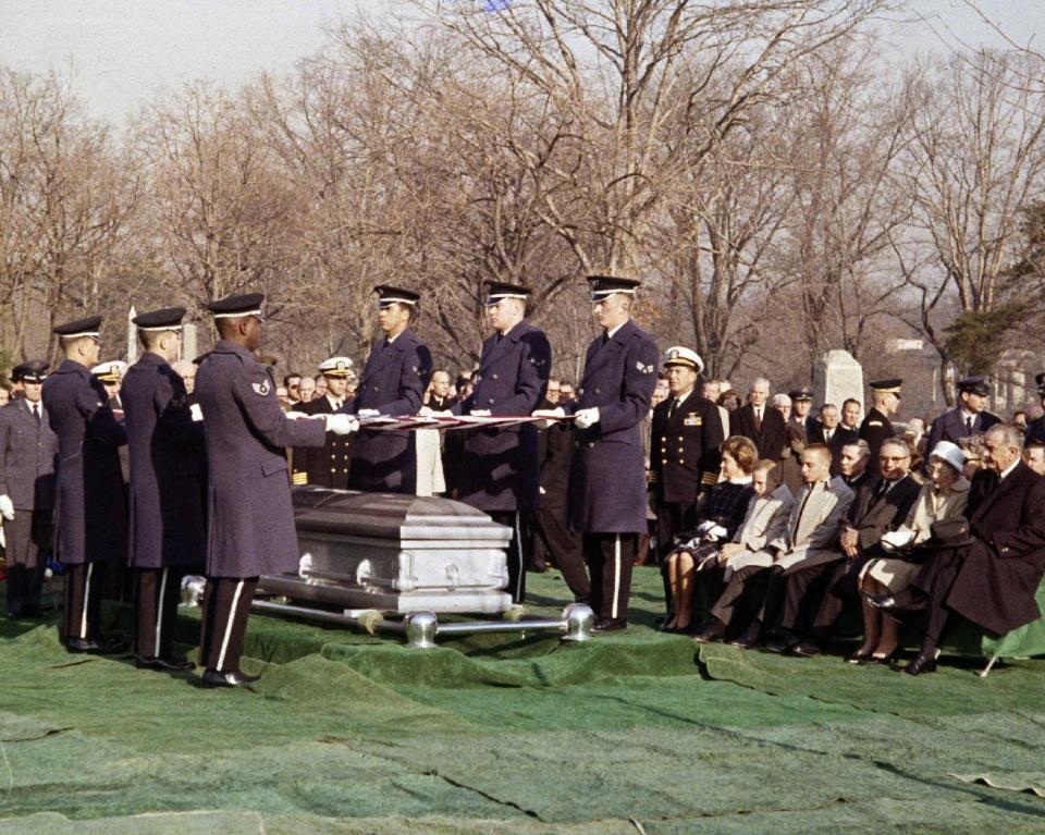 FILE - In this Jan. 31, 1967 file photo, mourners attend the burial of astronaut Virgil Grissom at the Arlington National Cemetery in Arlington, Va. Grissom, 40, was selected in 1959 as one of the seven original Mercury astronauts. Known as the hard luck astronaut, he had to swim for his life when his craft, Liberty Bell 7, sank after its descent on the second U.S. manned space flight July 21, 1961. (AP Photo)