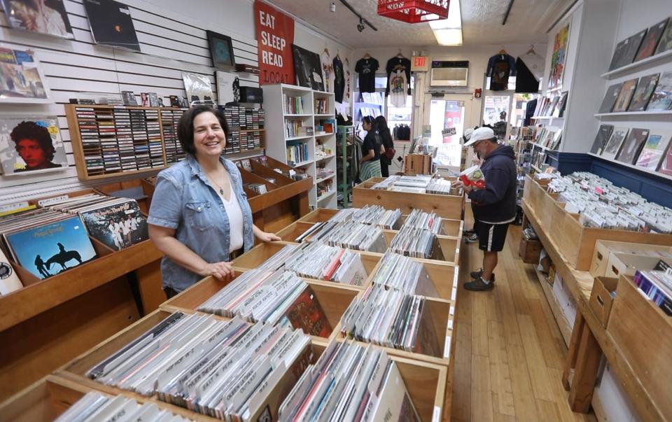 Co-owner Jennifer O'Connor with vinyl records at Main Street Beat in Nyack Sept. 15, 2023.