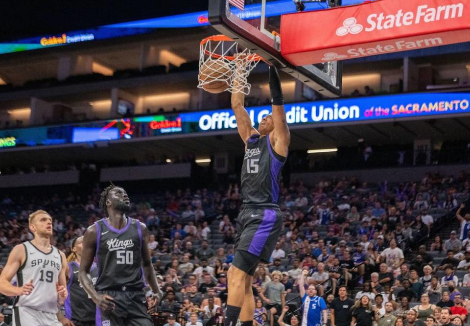 Sacramento Kings guard Boogie Ellis (15) dunks the ball during a California Classic NBA summer league game against the San Antonio Spurs on Sunday, July 7, 2024, at Golden 1 Center. Ellis scored a game-high 17 points.