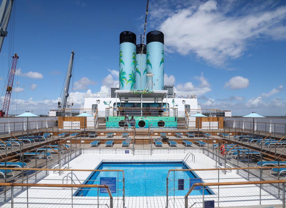 A passenger aboard the Margaritaville at Sea Paradise ship said she was sexually assaulted by a bartender on the first night of the Bahama-bound cruise.
