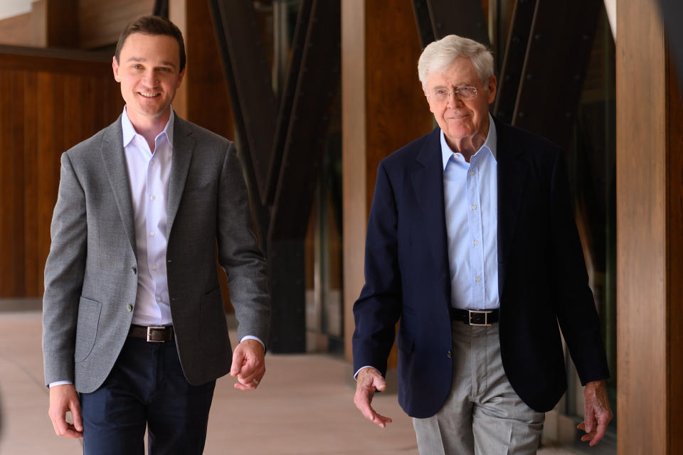 Brian Hooks (left), now CEO and chairman of the Koch network Stand Together, and Charles Koch attend an organizational gathering in Colorado Springs, Colorado, on June 29, 2019. (Photo: Daniel Boczarski via Getty Images)