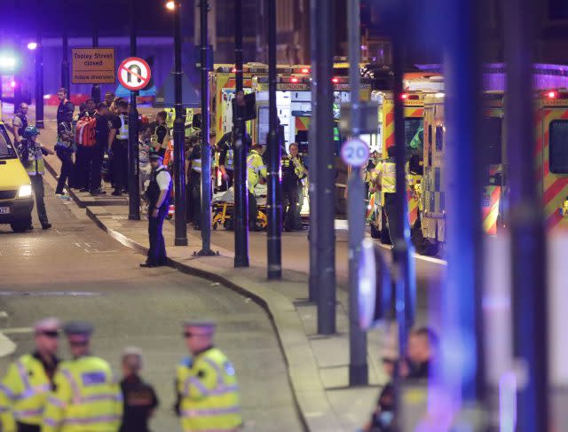 Emergency personnel tend to the wounded on London Bridge