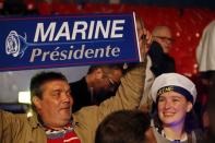 Supporters wait for the start of a campaign political rally for Marine Le Pen, French National Front (FN) political party leader and candidate for French 2017 presidential election, in Paris, France, April 17, 2017. REUTERS/Pascal Rossignol