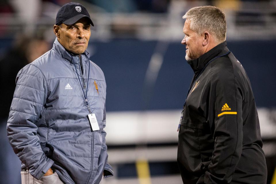 ASU's Herm Edwards and Shawn Slocum talk before the 4A State Championship between Salpointe and Saguaro on Friday, Nov. 30, 2018, at Arizona Stadium in Tucson, Ariz. #azhsfb