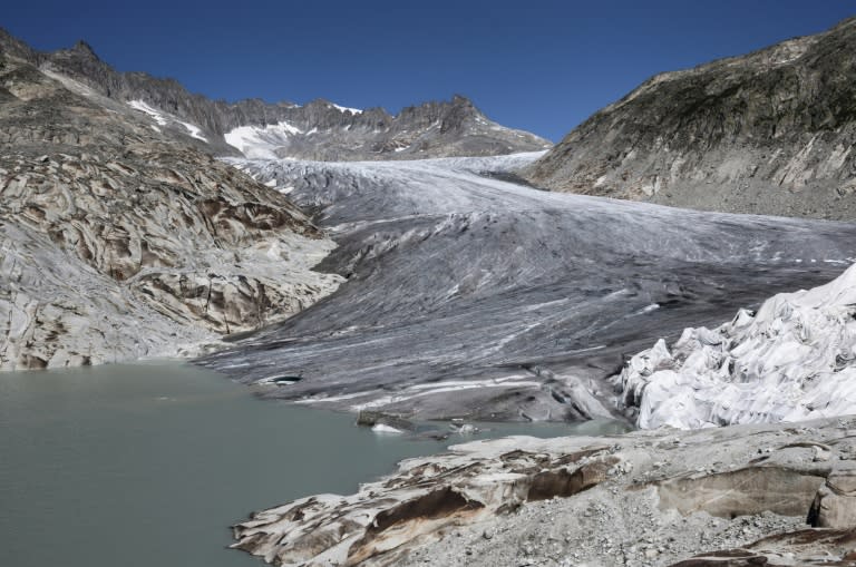 This view shows the Rhone Glacier and its glacial lake, near Gletsch on August 28, 2018, dubbed a 'year of extremes' for shrinking Swiss glaciers by the Swiss Academies of Science