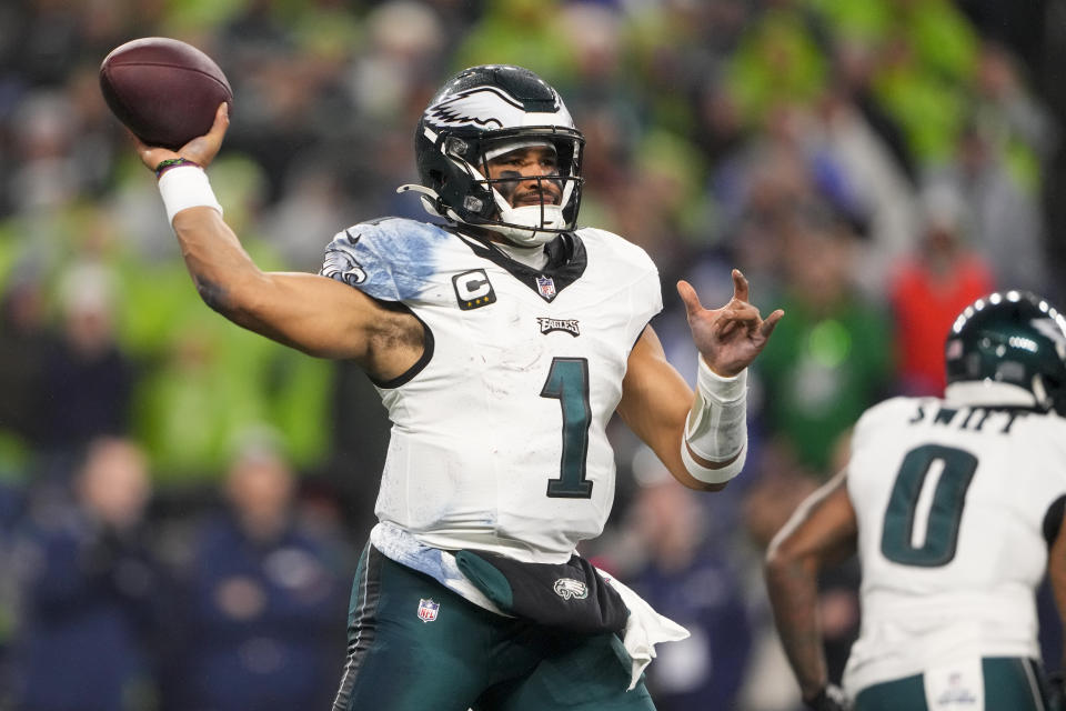 Philadelphia Eagles quarterback Jalen Hurts throws a pass against the Seattle Seahawks during the first half of an NFL football game, Monday, Dec. 18, 2023, in Seattle. (AP Photo/Lindsey Wasson)