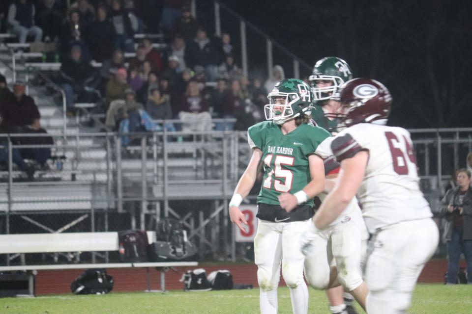 Oak Harbor's Mike Lalonde awaits the result of a  pass. It took a while because Hayden Buhro juggled it off his own hands, chest and head for a touchdown.