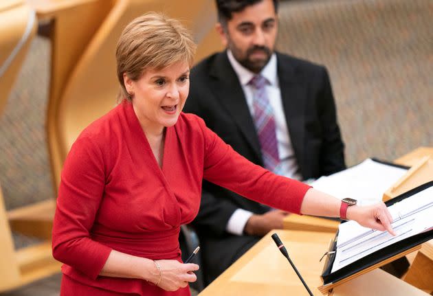 <strong>Nicola Sturgeon speaks at the Scottish parliament during First Minister's Questions.</strong> (Photo: JANE BARLOW via Getty Images)