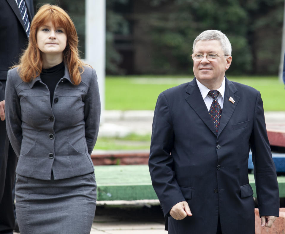 Maria Butina walks with Alexander Torshin then a member of the Russian upper house of parliament in Moscow, Russia.  (Photo: AP Photo/Pavel Ptitsin, File)