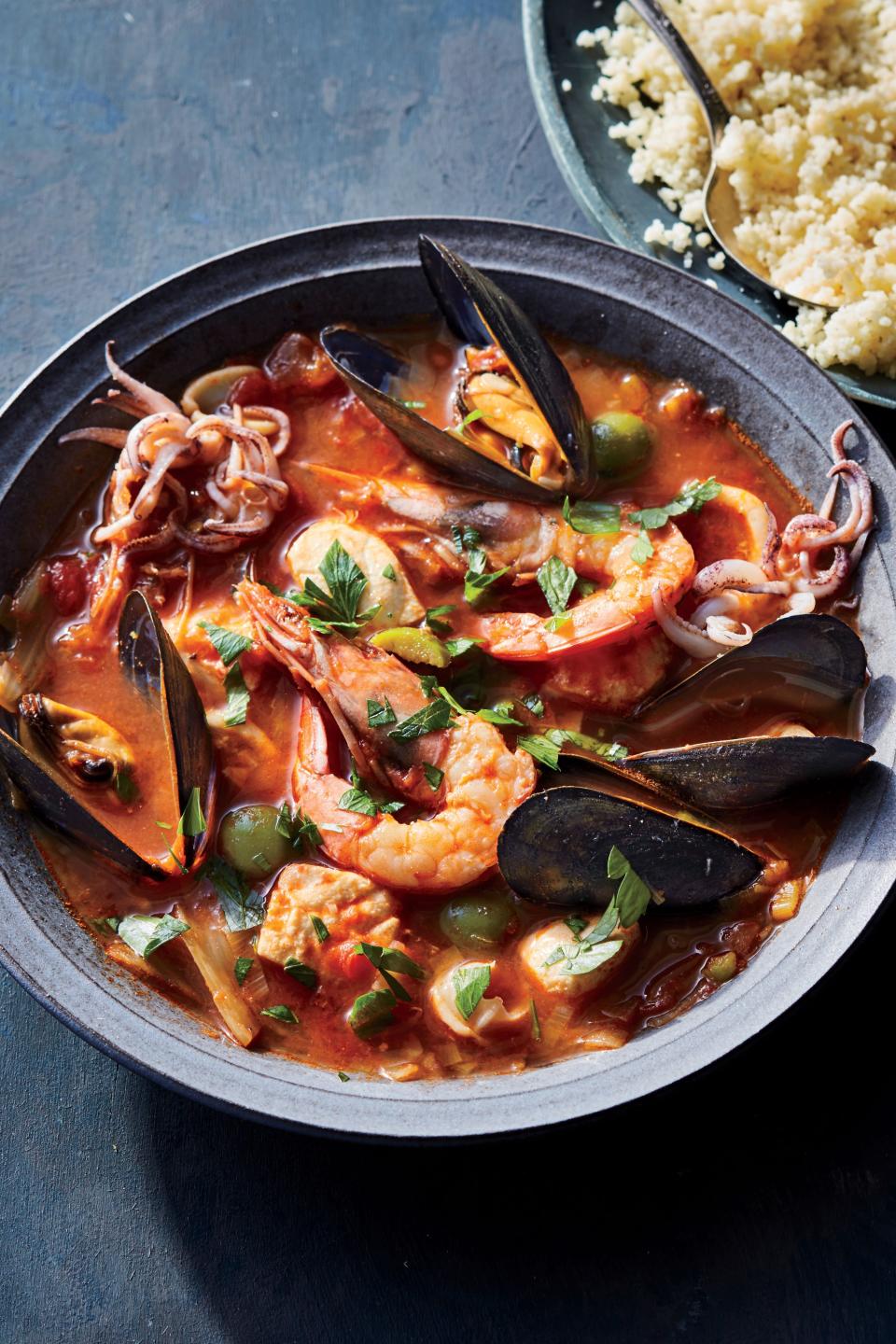 <p>Turn your seafood bounty into a satisfying stew with a distinctly Sicilian touch, thanks to the buttery Castelvetrano olives. Pro tip: add the mussels, shrimp, halibut, and squid into your garlicky tomato broth at the end to ensure they cook just right (and don’t get too rubbery).</p> <ul><li><strong>Recipe: <a href="https://www.coastalliving.com/recipe/sicilian-seafood-stew-couscous" rel="nofollow noopener" target="_blank" data-ylk="slk:Sicilian Seafood Stew with Couscous;elm:context_link;itc:0;sec:content-canvas" class="link ">Sicilian Seafood Stew with Couscous</a></strong></li> </ul>