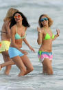 March 13, 2012: Selena Gomez and Vanessa Hudgens seen playing in the surf at the beach during the filming of "Spring Breakers" in St. Petersburg, Florida. Mandatory Credit: INFphoto.com Ref: infusmi-13