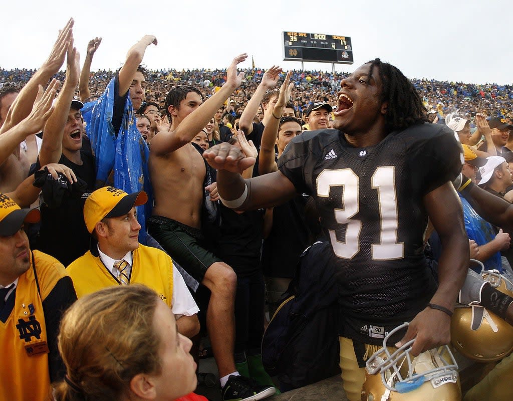 ergio Brown #31 of the Notre Dame Fighting Irish celebrates with fans after a 35-17 victory over the Michigan Wolverines on September 13, 2008 at Notre Dame Stadium in South Bend, Indiana. (Getty Images)