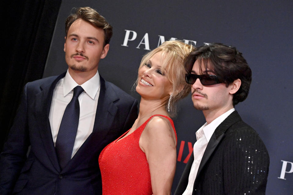 HOLLYWOOD, CALIFORNIA - JANUARY 30: (L-R) Brandon Thomas Lee, Pamela Anderson, and Dylan Jagger Lee attend the Premiere of Netflix's 