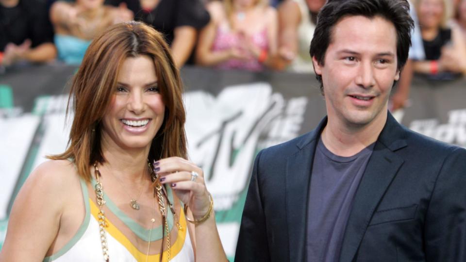 Sandra Bullock and Keanu Reeves. Photo by John Shearer/WireImage.