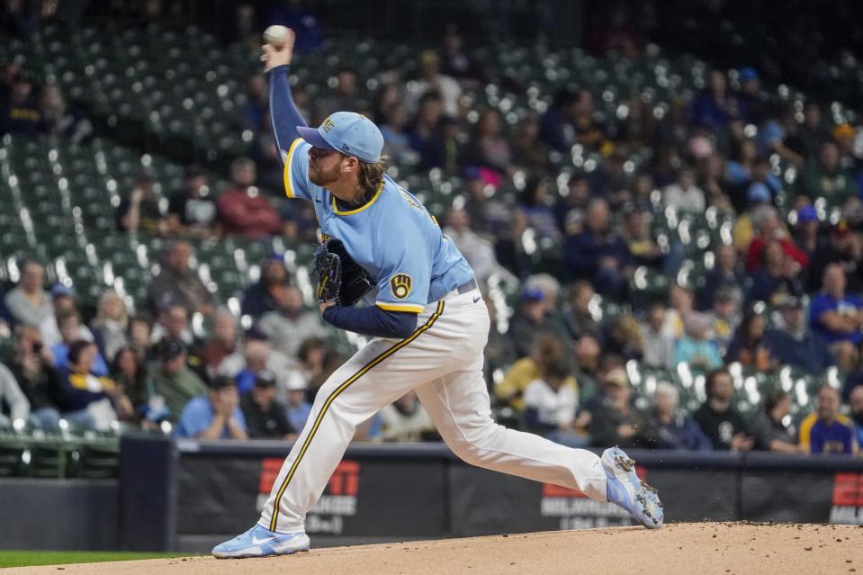 Milwaukee Brewers starting pitcher Corbin Burnes throws during the first inning of a baseball game against the Miami Marlins Friday, Sept. 30, 2022, in Milwaukee. (AP Photo/Morry Gash)