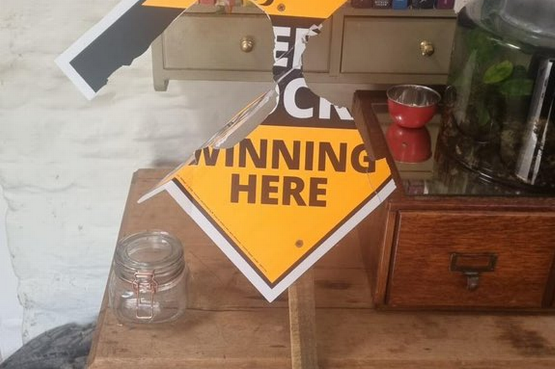 One of the Liberal Democrat boards which have been vandalised in the Cotswolds